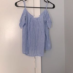 A blue over the shoulder top